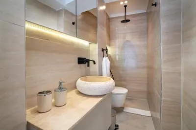 a bathroom with a sink and a toilet at Pia Global - Nevizade in Istanbul