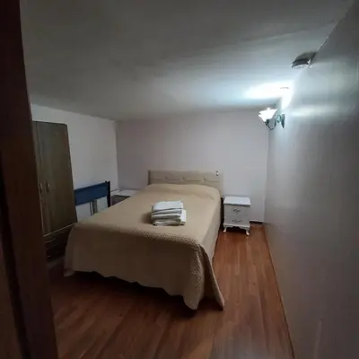 a bedroom with a bed with two towels on it at Coskun apt in Istanbul