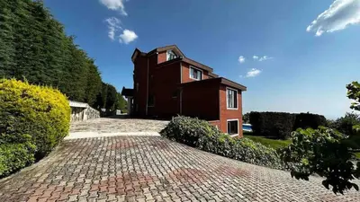 a brick house on a brick road at Luxury Mansion Amazing View, Hidden Garden in Celâliye