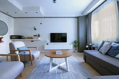 a living room with a couch and a table at Excellent Apartments Fatih Nova in Istanbul