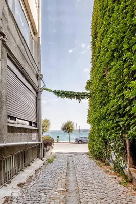 a cobblestone street in front of a building at Luxury Seaside Apartment with Bosphorus View in Sarıyer in Sarıyer
