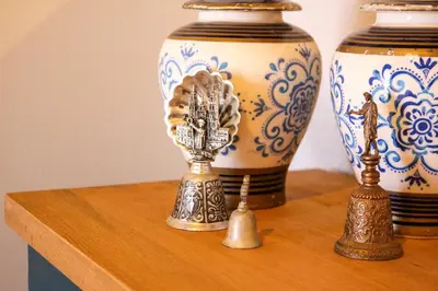 a couple of vases on a wooden shelf at Mints Hotel Ağva in Agva