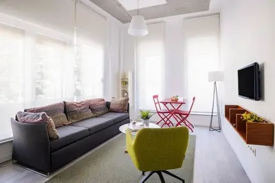 a living room with a couch and a table at Cute Compact 1Bd1Bath Gem Shared Terrace! #397 in Istanbul