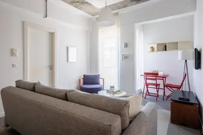 a living room with a couch and a table at Stunning Serene 2BD1Bath Bosphorus Retreat! #400 in Istanbul
