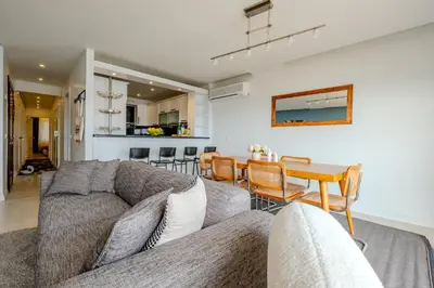 a living room with a couch and a table at Bosphorus View with 3 Bedrooms and 2 Bathrooms in Istanbul