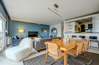 a living room with a table and a couch at Bosphorus View with 3 Bedrooms and 2 Bathrooms in Istanbul