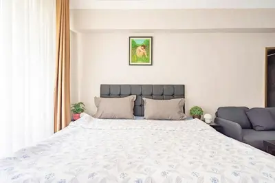 a bedroom with a large bed and a couch at 1st Floor Historic Flat in Old Istanbul in Istanbul
