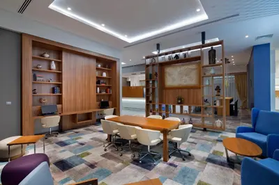 a dining room with a table and chairs at Hampton By Hilton Kocaeli Symbol in Kocaeli