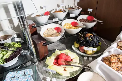 a buffet with different types of food on display at Antusa Palace Hotel & Spa in Istanbul