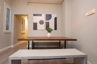 a table in a room with a potted plant on it at 3 Bedrooms and Central Location in Istanbul