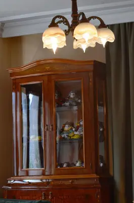 a wooden cabinet with two lights on top of it at Heart of Yesilkoy-Green village in Istanbul