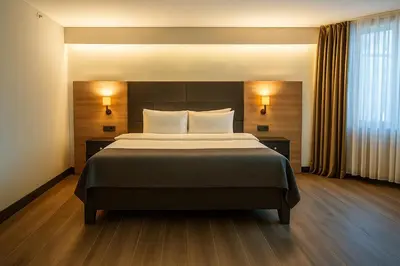 a bedroom with a large bed and a large window at Rest By Dedeman Sapanca in Sapanca