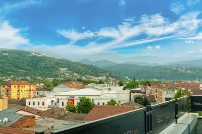 a view of a city with mountains in the background at Rest By Dedeman Sapanca in Sapanca