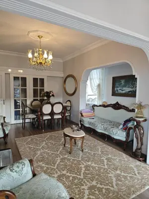 a living room with a bed and a dining room at An İstanbul tale, İstanbul dream,bosphorus villa in Istanbul