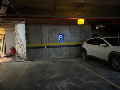 a parking garage with a car parked in it at new luxury comfortable apartment in Istanbul