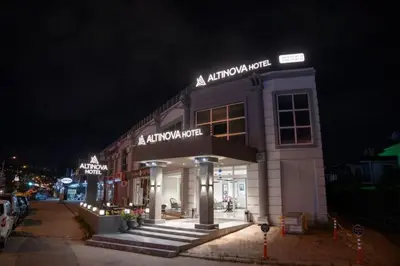 a building at night with lights on it at Altınova Hotel Sakarya in Serdivan