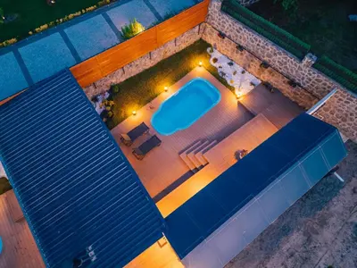 an overhead view of a swimming pool at night at The Now Sapanca Suites in Sapanca