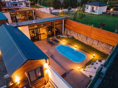 an aerial view of a house with a swimming pool at The Now Sapanca Suites in Sapanca