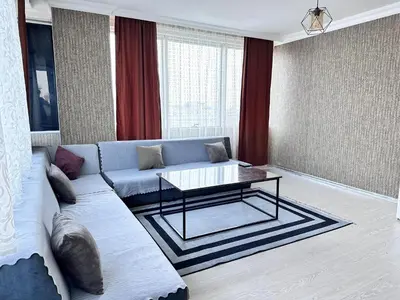 a living room with a couch and a coffee table at 216 Blue Life in Istanbul