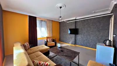 a living room with a couch and a table at 216 Blue Life in Istanbul