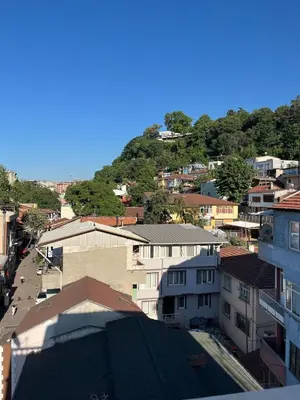 a view of a city with buildings and a mountain at Poyraz suit in Bursa