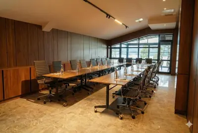 a large conference room with a long table and chairs at Wellwood Otel in Sapanca