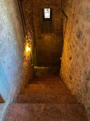 a staircase in a stone building with a window at Welcome to the presence of history! in Istanbul