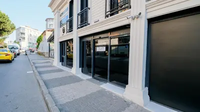 a row of store fronts on a city street at Nomad Hub Suit İstanbul in Istanbul