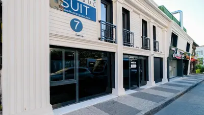 a store front with glass windows on a street at Nomad Hub Suit İstanbul in Istanbul