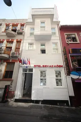 a white building with the entrance to an oldbury rover at Beyaz Köşk Hotel in Istanbul