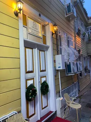 a front door of a house with wreaths on it at Grand Süleymaniye Hotel in Istanbul