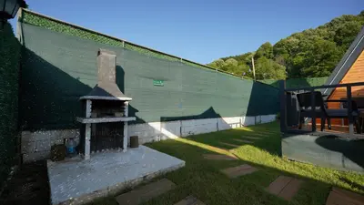 a wall with a monument on the side of a building at Hilltop Bungalov Sapanca 3 in Sapanca