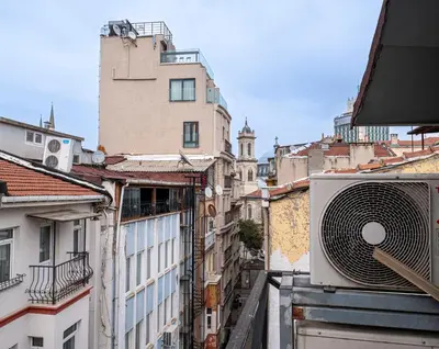 an overhead view of a city with a fan at Nine Rooms by taksim in Istanbul