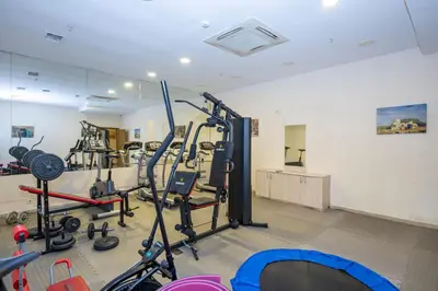 a gym with a lot of equipment in a room at Harmony Hotel Merter & SPA in Istanbul
