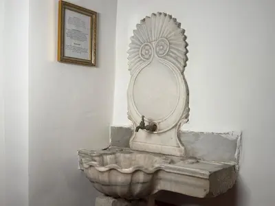 a statue of a chicken sitting on top of a bowl at Bosphorus Villa Arnavutköy 5BR for 12 Guests in Istanbul