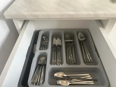 a drawer filled with utensils in a kitchen at Karakaş Homes in Istanbul