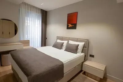 a bedroom with a large bed in a room at Boamonti Residence Sisli Apart in Istanbul