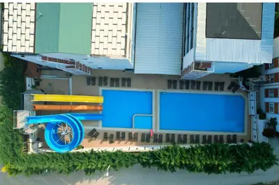 an overhead view of two large blue billboards on a building at Altuncu Premium Termal Hotel in Armutlu