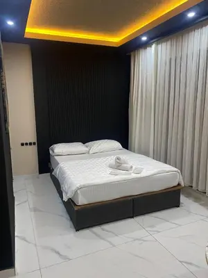 a bedroom with a large bed with white sheets at paradise hotel in Istanbul