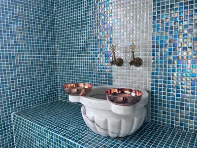a blue tiled bathroom with a toilet with two bowls at Treekos Boutique Hotel Istanbul Airport in Karaburun