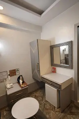 a dressing room with a counter and a mirror at Kurban Otel in Istanbul