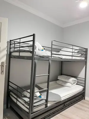 a room with two bunk beds in a room at Quiet House in İznik
