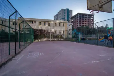 an empty basketball court in a city at Cozy 1BR & Sofabed with Two Inviting Balconies in Beylikduzu