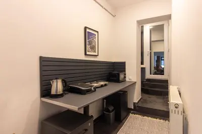 a room with a counter with a coffee maker on it at Eclectic 1BR with Charm in the Heart of Cihangir in Istanbul