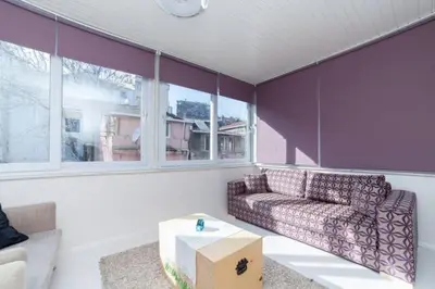 a living room with a couch and a table at Private house with 4 separate apartments-for families & friend groups in Istanbul