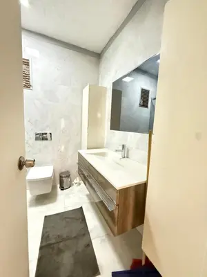 a bathroom with a sink and a mirror at Residence 4 in Istanbul