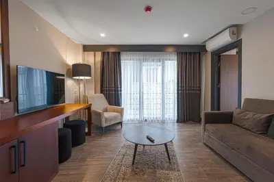 a living room with a couch and a coffee table at Best Western Plus Sapanca in Sapanca