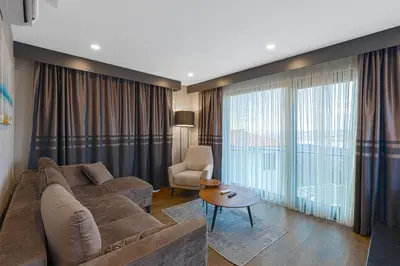 a living room with a couch and a table at Best Western Plus Sapanca in Sapanca