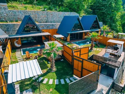 an aerial view of a house with a swimming pool at Bungorise Bungalov in Sapanca