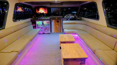 a bus with couches and a table in a bar at Private Luxury Bosphorus Yacht 2 Continents Experience in Istanbul